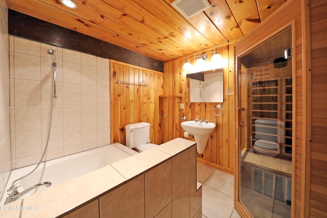 233 Algerie Rd, Becket, MA 01223 - bathroom with tile patterned floors, wooden walls, wooden ceiling, and a relaxing sauna