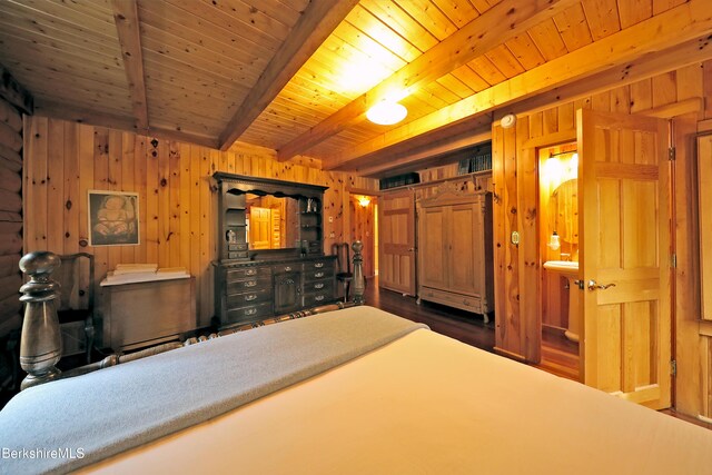 233 Algerie Rd, Becket, MA 01223 - bedroom with wood walls and a wooden ceiling with exposed beams