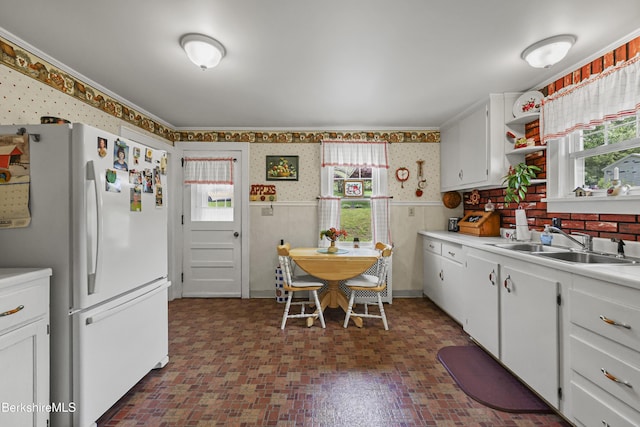 15 Summit Ave, Adams, MA 01220 - kitchen featuring freestanding refrigerator, wallpapered walls, plenty of natural light, light countertops, and wainscoting