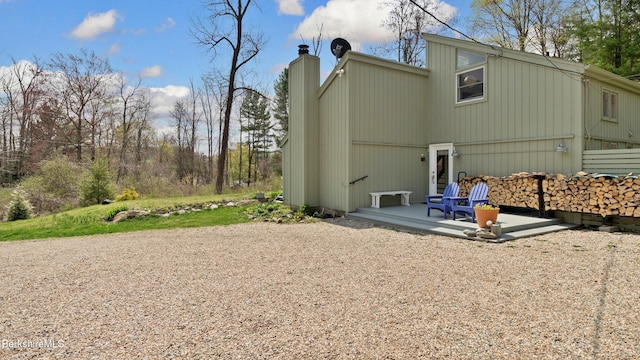 rear view of house with a chimney