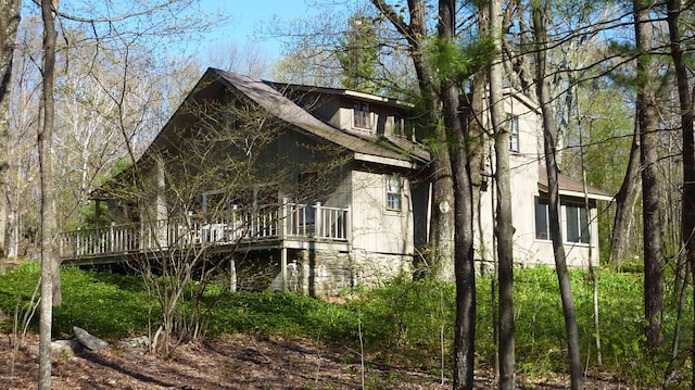 exterior space featuring a wooden deck