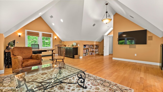 13 Taconic Ave, Lenox, MA 01240 - living room with vaulted ceiling and light wood-style flooring