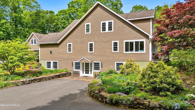 13 Taconic Ave, Lenox, MA 01240 - view of front of property with french doors and roof with shingles