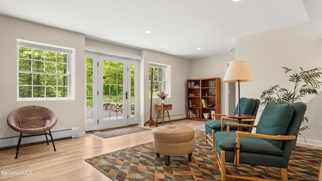 13 Taconic Ave, Lenox, MA 01240 - sitting room with wood finished floors, a baseboard heating unit, and recessed lighting