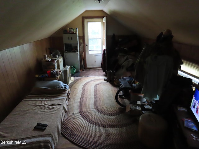 121 Commercial St, Adams, MA 01220 - additional living space with wooden walls, vaulted ceiling, and carpet floors