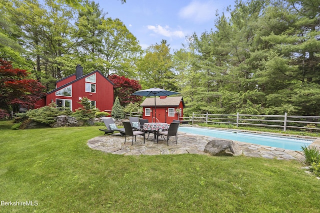 171 Lake Shore Dr, Otis, MA 01253 - view of yard featuring an outbuilding and a patio area