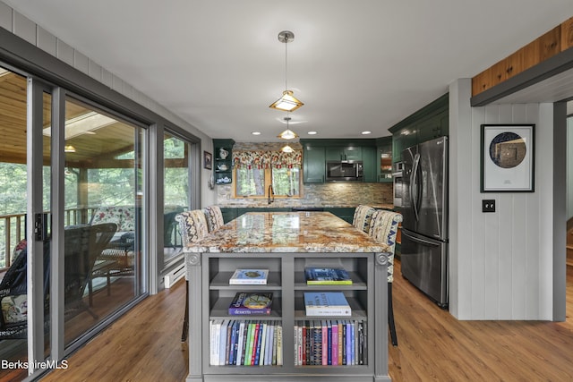171 Lake Shore Dr, Otis, MA 01253 - kitchen featuring open shelves, freestanding refrigerator, stainless steel microwave, and green cabinetry