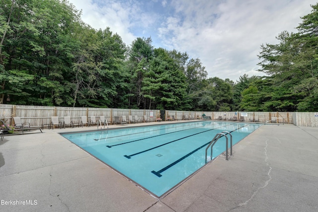 171 Lake Shore Dr, Otis, MA 01253 - community pool with a patio area