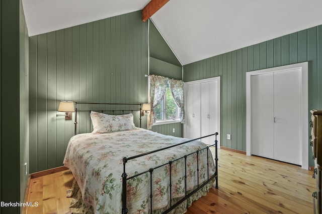 171 Lake Shore Dr, Otis, MA 01253 - bedroom with wood-type flooring and wood walls
