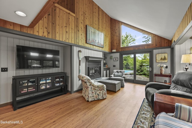 171 Lake Shore Dr, Otis, MA 01253 - living area with wood finished floors, wood walls, and high vaulted ceiling
