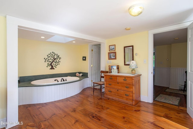 367 N Plain Rd, Great Barrington, MA 01236 - full bath featuring hardwood / wood-style flooring, a garden tub, and vanity