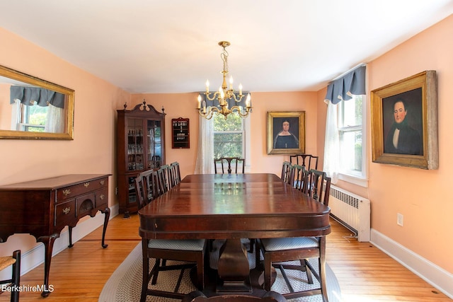 367 N Plain Rd, Great Barrington, MA 01236 - dining room featuring a notable chandelier, baseboards, radiator heating unit, and light wood-style floors