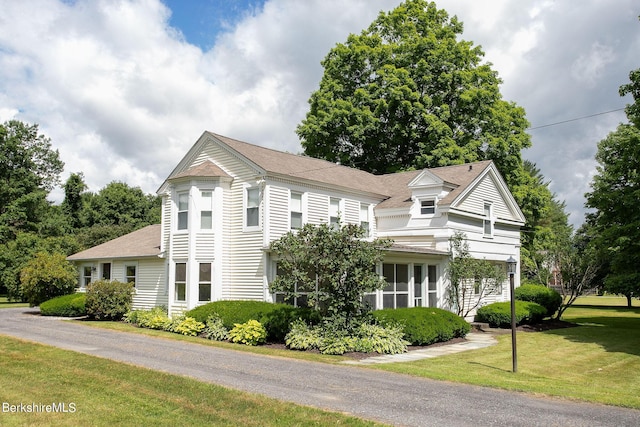 367 N Plain Rd, Great Barrington, MA 01236 - view of property exterior with a yard and roof with shingles