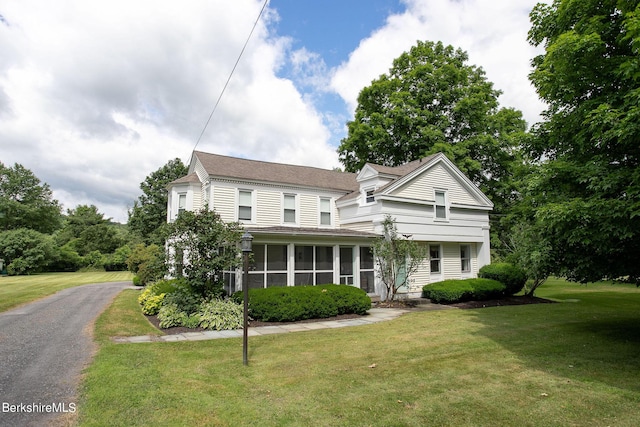 367 N Plain Rd, Great Barrington, MA 01236 - view of front of home featuring a sunroom, a front yard, and roof with shingles