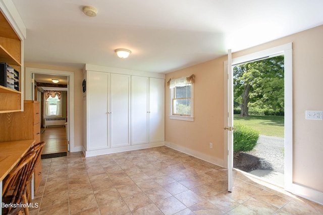 367 N Plain Rd, Great Barrington, MA 01236 - interior space with multiple windows, radiator heating unit, baseboards, and access to outside