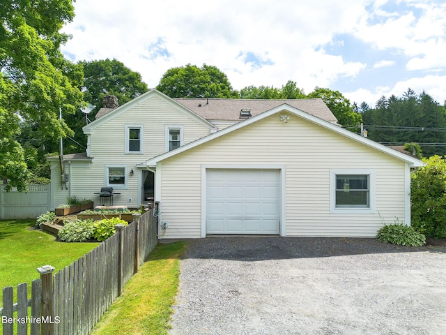 367 N Plain Rd, Great Barrington, MA 01236 - view of front of house featuring an attached garage, gravel driveway, and fence