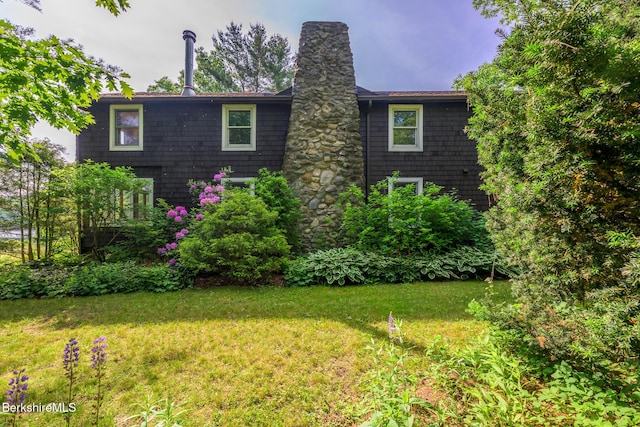 144 Shore Rd, Richmond, MA 01254 - view of side of home featuring a chimney and a lawn