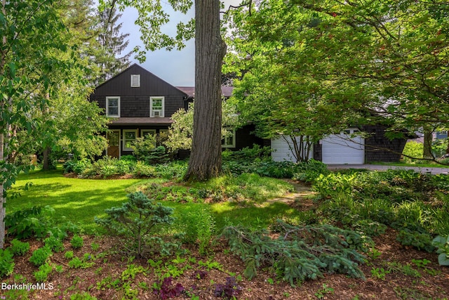144 Shore Rd, Richmond, MA 01254 - view of green lawn featuring a garage