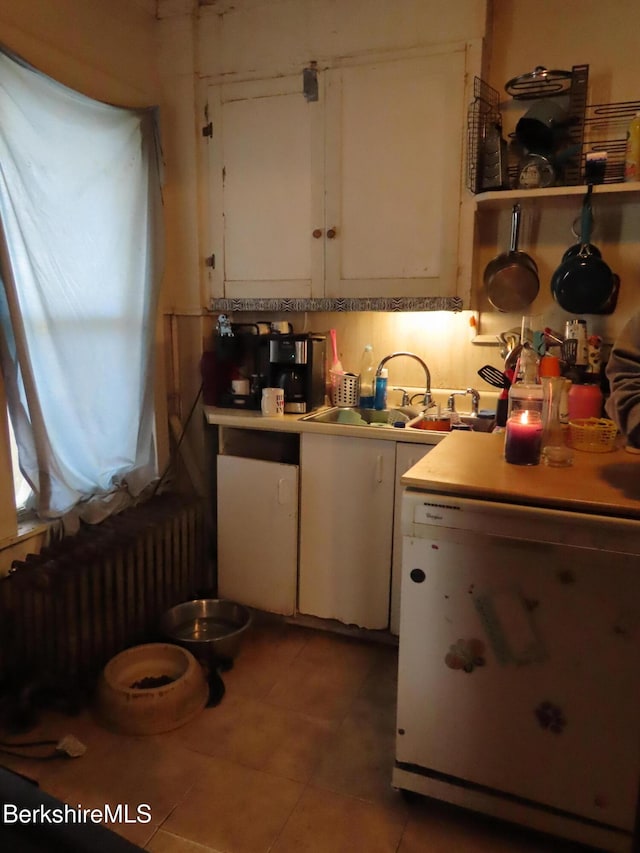 164-166 Houghton St, North Adams, MA 01247 - kitchen featuring white cabinetry, a sink, and light countertops