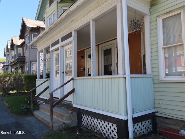 164-166 Houghton St, North Adams, MA 01247 - view of home's exterior featuring covered porch