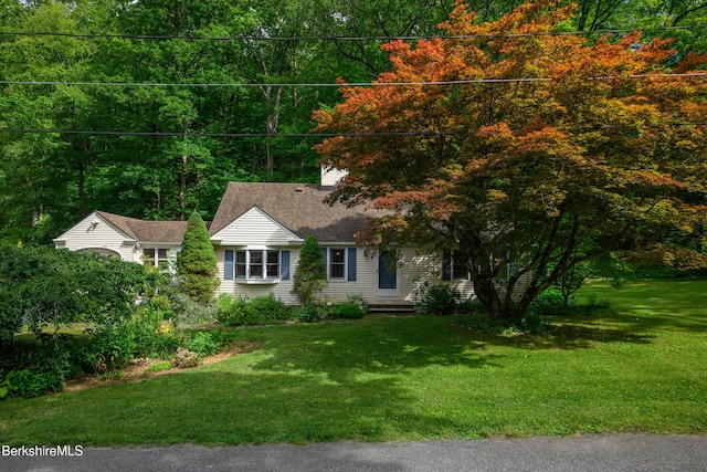 160 Marion Ave, North Adams, MA 01247 - view of front of home with a front lawn and a view of trees