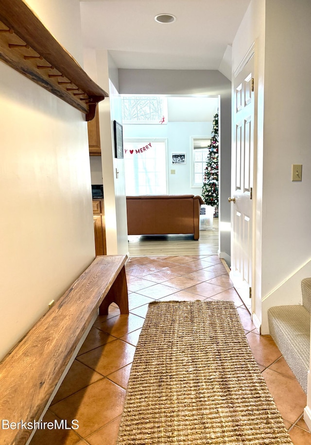 hallway with light tile patterned flooring