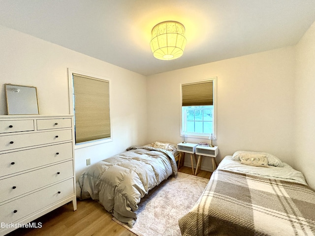 bedroom featuring light wood-type flooring