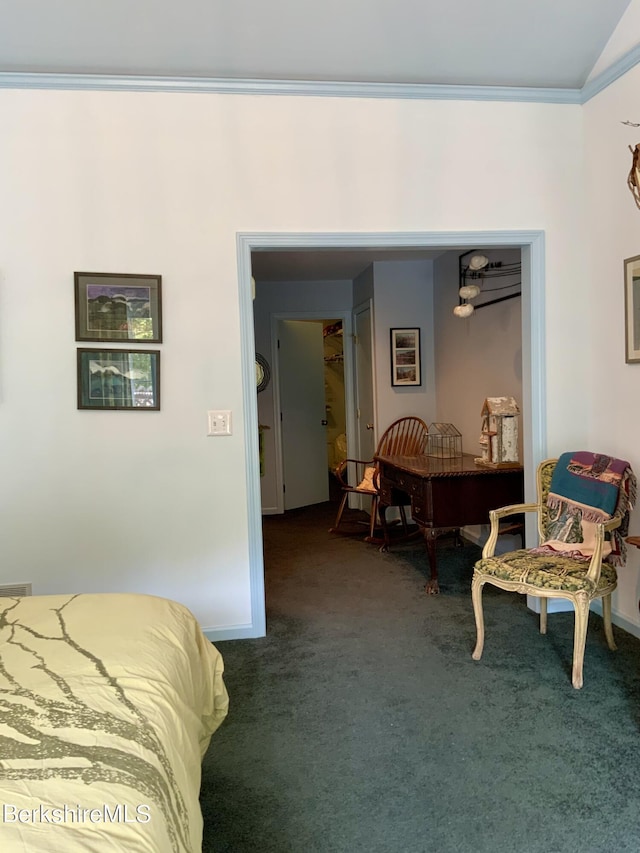carpeted bedroom featuring baseboards