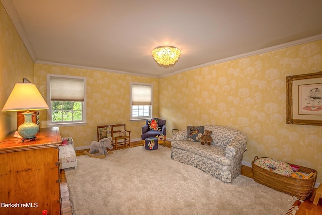 1136 Barker Rd Unit 65, Pittsfield, MA 01201 - sitting room featuring crown molding, a chandelier, and wallpapered walls