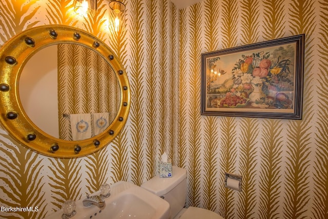 1136 Barker Rd Unit 65, Pittsfield, MA 01201 - bathroom featuring wallpapered walls and toilet