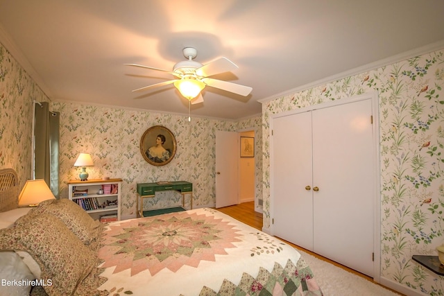 1136 Barker Rd Unit 65, Pittsfield, MA 01201 - bedroom with wallpapered walls, ornamental molding, a closet, ceiling fan, and wood finished floors