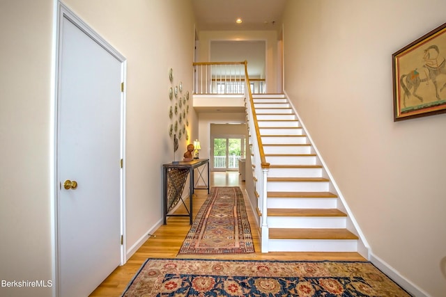 1136 Barker Rd Unit 65, Pittsfield, MA 01201 - stairway with wood finished floors and baseboards