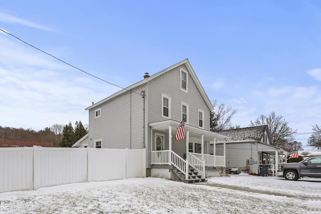 view of front of property featuring covered porch