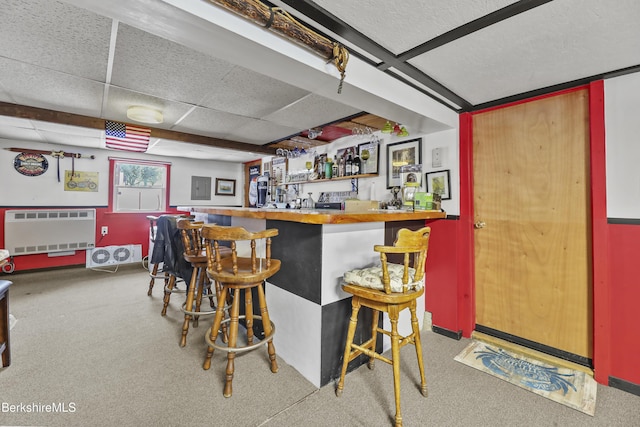 bar with heating unit and a drop ceiling