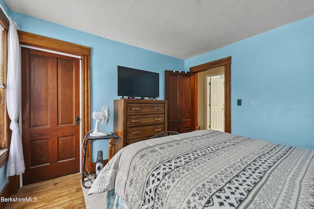 bedroom featuring light wood-type flooring