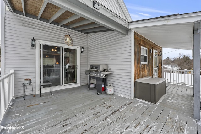 wooden deck with grilling area