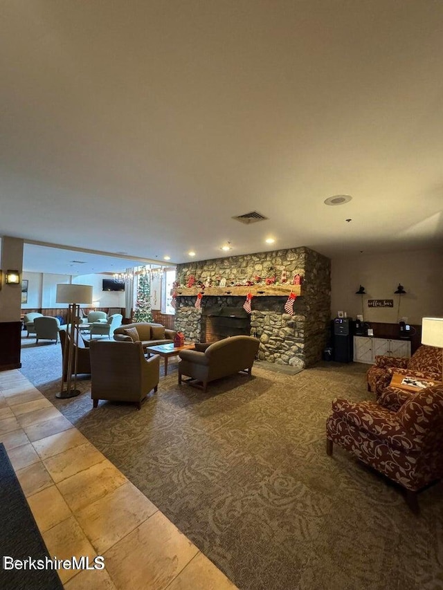 tiled living room with a fireplace