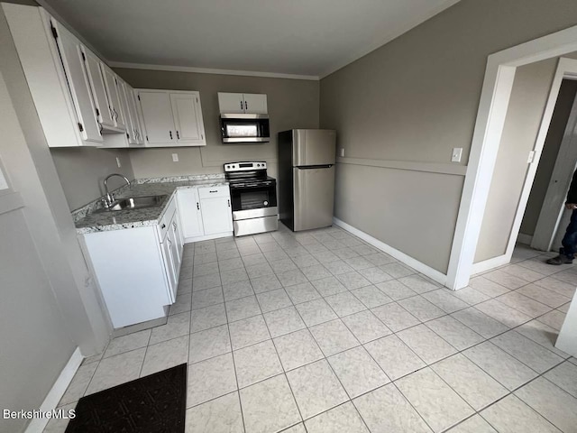 kitchen featuring appliances with stainless steel finishes, sink, white cabinets, crown molding, and light stone countertops