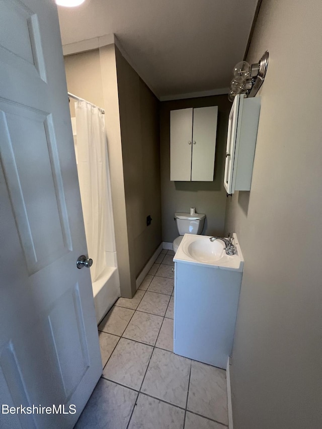 full bathroom with shower / tub combo, vanity, toilet, and tile patterned flooring