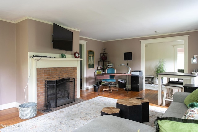 6-10 Manville St, Great Barrington, MA 01230 - living area with wood finished floors, a brick fireplace, ornamental molding, and an office area