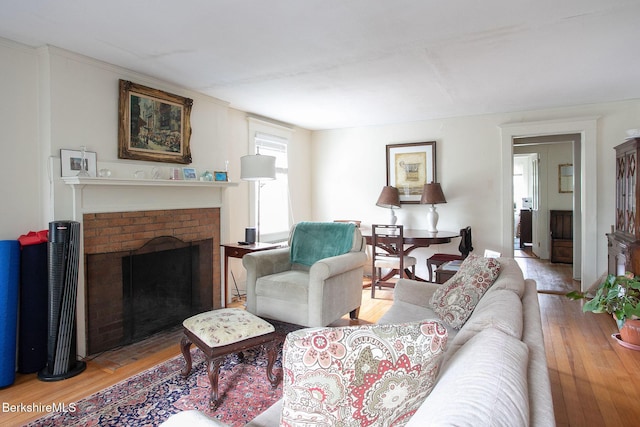 6-10 Manville St, Great Barrington, MA 01230 - living area with light wood-style floors and a fireplace