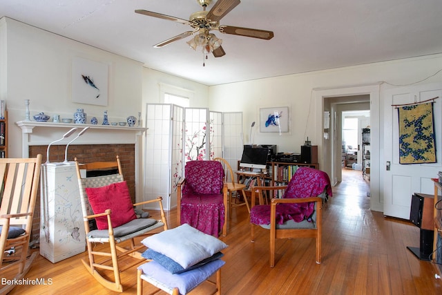 6-10 Manville St, Great Barrington, MA 01230 - living area with a ceiling fan, hardwood / wood-style flooring, and a fireplace