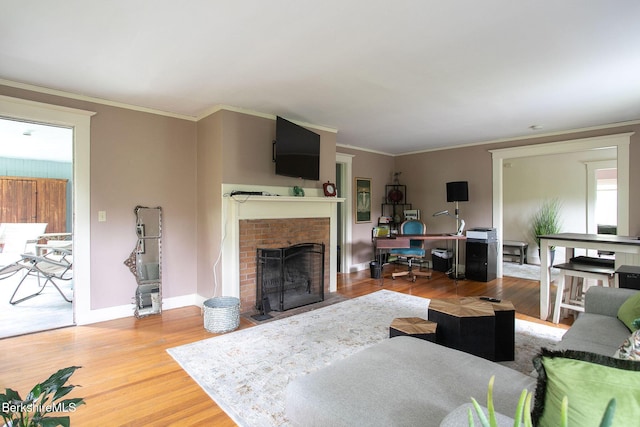 6-10 Manville St, Great Barrington, MA 01230 - living area featuring a fireplace, wood finished floors, crown molding, and an office area