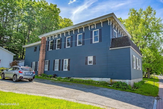 35 Main St, West Stockbridge, MA 01266 - view of property exterior featuring roof with shingles