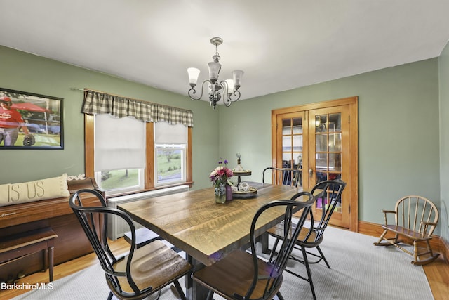 5 N St, Adams, MA 01220 - dining area with a chandelier, wood finished floors, and french doors