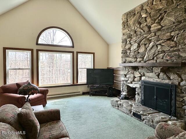 791 Partridge Rd, Lanesborough, MA 01237 - living room featuring a baseboard radiator, carpet flooring, high vaulted ceiling, and a fireplace