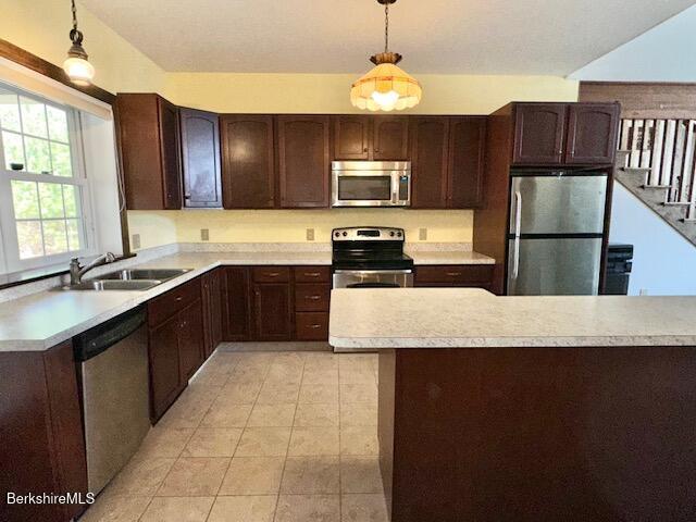 791 Partridge Rd, Lanesborough, MA 01237 - kitchen featuring appliances with stainless steel finishes, a sink, light countertops, and dark brown cabinets