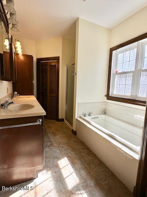 791 Partridge Rd, Lanesborough, MA 01237 - full bathroom featuring a garden tub, vanity, and a stall shower