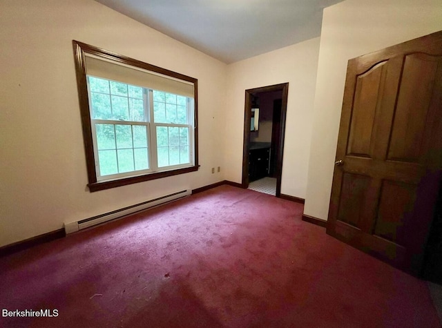 791 Partridge Rd, Lanesborough, MA 01237 - unfurnished bedroom featuring a baseboard radiator, carpet floors, baseboards, and ensuite bath
