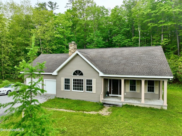 791 Partridge Rd, Lanesborough, MA 01237 - view of front of house with a shingled roof, a porch, a garage, and a front yard